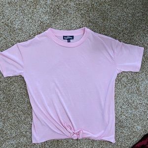 Pink top by freshman